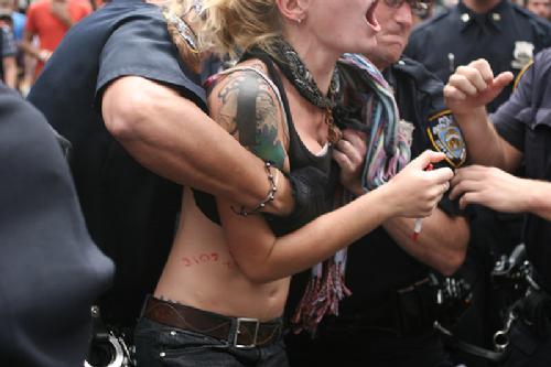 NYPD cop checks for weapons